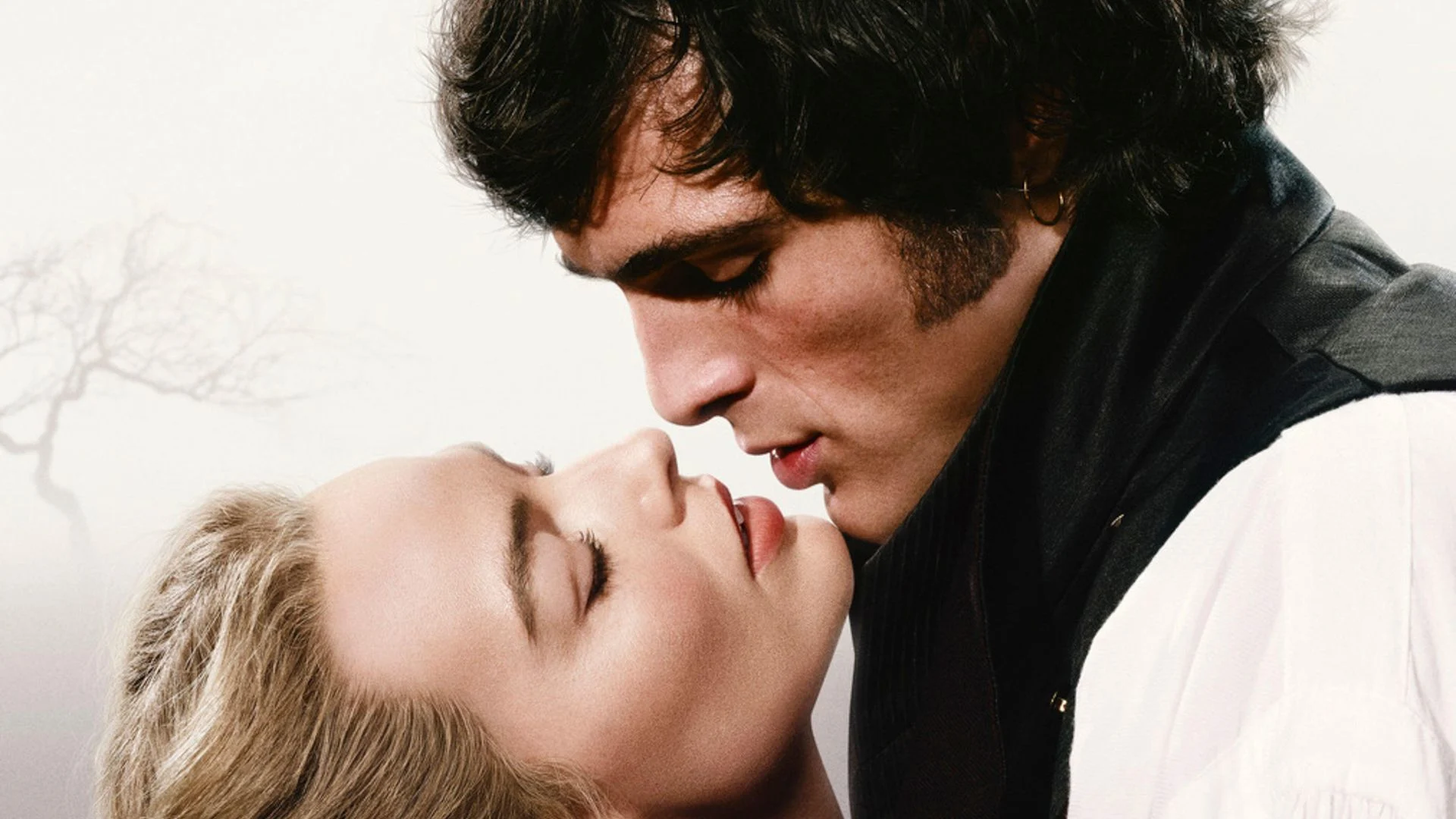Jacob Elordi as Heathcliff, holding Margot Robbie as Catherine very close, nearly kissing.